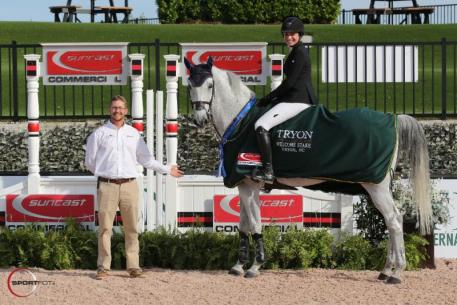 Catherine Tyree and Bokai in their presentation ceremony with Assistant Show Manager Lance Bennett.