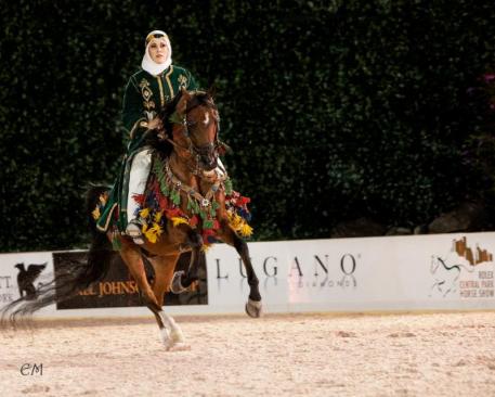 Cathy Vecsey and HL Sanction on their way to winning the Native Costume Class. Photo by Emma Maxwell