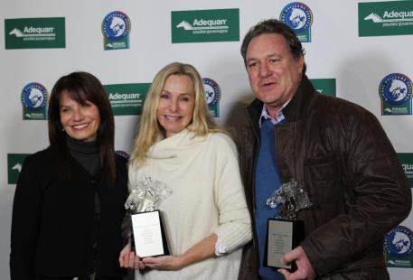 Carol Cohen presents Katherine and Mark Belissimo with the Global Dressage Visionary Award 