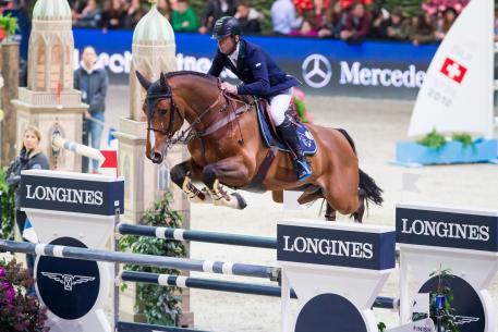 Denis Lynch (IRL) riding All Star to 2nd place.