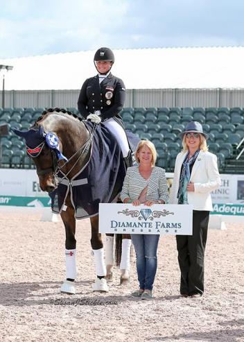 Diana Porsche and Di Sandro in their winning presentation with Terri Kane of Diamante Farms and judge Irina Maknami.