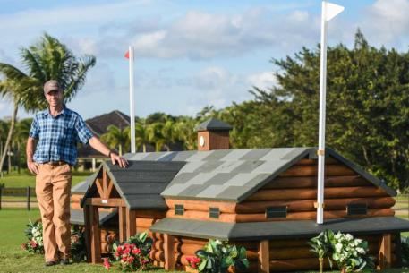 Course builder Eric Bull stands next to one of the cross-country obstacles on course for the 2016 Asheville Regional Airport Wellington Eventing Showcase, presented by Wellington Equestrian Realty.  
