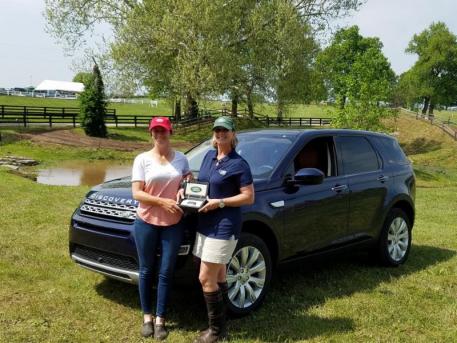 Helen McDonald, Events and Partnerships Manager, Jaguar Land Rover North America (right) presents Erin Sylvester (left) with the keys to her 2017 Land Rover Discovery Sport for being the 'Best Ride of the Day.'
