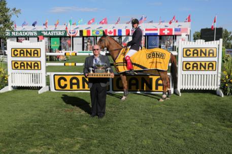 Gregory Wathelet and Algorhythem in their winning presentation with John Simpson, Chairman, The CANA Group of Companies (Photo: © Spruce Meadows Media Services)