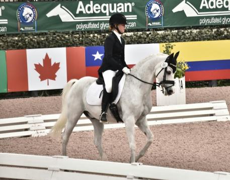 Hannah Irons and Bohdjan win the Pony Championship at the 2016 Florida International Youth Dressage Championships