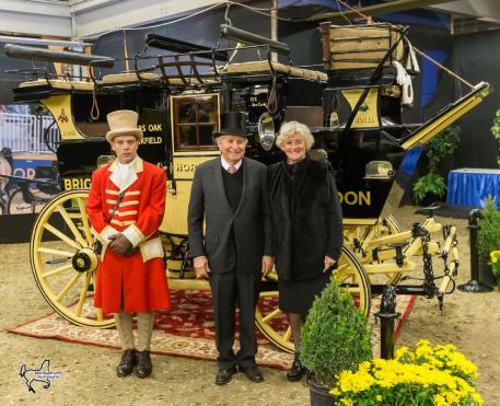Harvey (center) and Mary (right) Waller with their historic road coach the ‘Old Times,’ winner of the Green Meadows Four-In-Hand Coaching Appointments class at the Royal Horse Show.