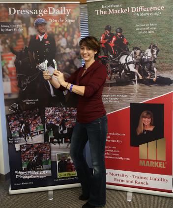 Lisa Marie Bishop poses with Valegro's shoe
