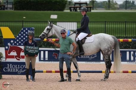 Hunter Holloway and Donnalaris in their presentation ceremony with George Morris and Caroline McLeese.