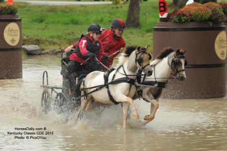 Mary Phelps and Bram Chardon in the water at the Kentucky Horse Park