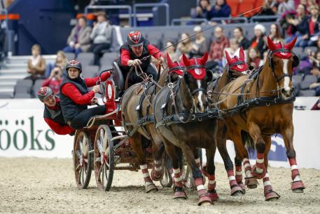 Jérome Voutaz from switzerland with his Four-in-Hand team. FEI World Cup™ Driving Final Photo (FEI/Stefan Lafrentz)