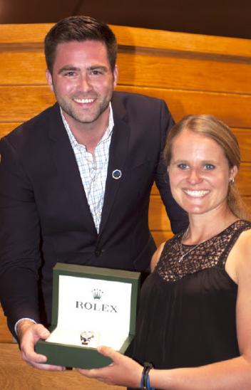 Jordan Linstedt of Washington won the competitors's draw for a Rolex watch at the welcome reception. Kyle Younghans of Rolex Watch USA presents her with her prize. (Michelle Dunn Photo)