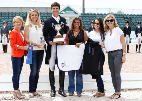 The 2016 Overall Florida International Youth Dressage Champion Juan Matute Jr. (ESP) in the presentation ceremony with Terri Kane, Kim Boyer, Jessica Newman and Molly McDougall from JustWorld International, and Sarah Davis