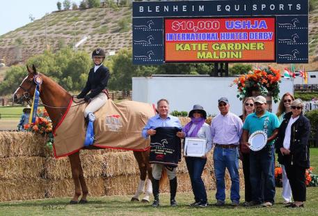 Katie Gardner is all smiles as she and Maldini celebrate the win  in the 0,000 USHJA International Hunter Derby