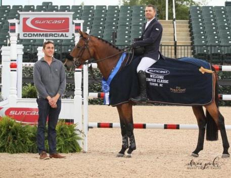 Kent Farrington and Gazelle in their presentation ceremony with Josh Zorn of TIEC.
