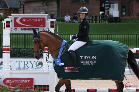 Lacey Gilbertson and Baloppi in their presentation ceremony at TIEC.
