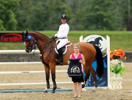 Mclain Ward accepting the award for first and second place aboard Zerly in the $25,000 SmartPak Grand Prix. 