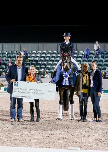 Mikala Gundersen and My Lady in their presentation ceremony with Thomas Baur of AGDF, groom Julie Albrechtsen, Janne Rumbough, and Cora Causemann of AGDF.