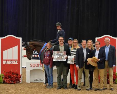 Peter Petschenig and Saint Quentin celebrate the win in the Markel Grand Prix Series Final with (l-r) their groom Deborah Kunath, Director of Equine Operations for Markel Insurance Brandon Seger, Petschenig's coach Allen Clarke, Lauren Davis of EquiFit, inc., and Markel Insurance's Chris Norden, Julian Bowan-Rees and John Seger
