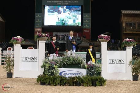 Andy Kocher, Shane Sweetnam, and Adrienne Sternlicht in their presentation ceremony following the 30,000 Suncast® Grand Prix CSI 3*. 