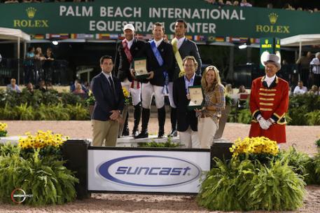 Eric Lamaze, McLain Ward, and Sergio Alvarez Moya in the top three presentation with Kyle Younghans, Sports Marketing Manager, Rolex Watch USA; Mark and Katherine Bellissimo of Equestrian Sport Productions; and ringmaster Steve Rector.