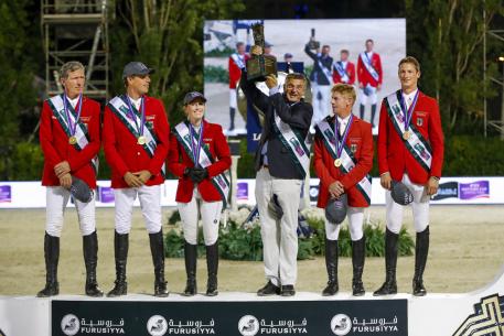 Team Germany, Furusiyya FEI Nations Cup™ 2016 champions, on the podium in Barcelona (ESP) tonight: (L to R) Ludger Beerbaum, Christian Ahlmann, Janne Friederike Meyer, Otto Becker (Chef d’Equipe), Marcus Ehning and Daniel Deusser. (Dirk Caremans/FEI)
