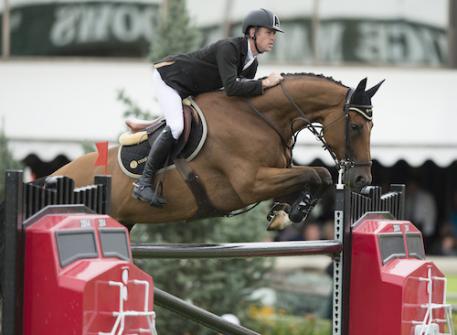 Scott Brash of GBR riding Hello Sanctos during the .5 Million CP International, presented by Rolex, at the Spruce Meadows Masters.