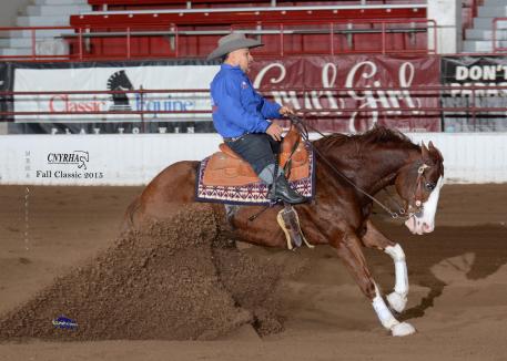 Fred Win slides to the win on his new partner, Rem N Trash. 