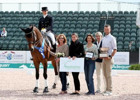 Tinne Vilhelmson-Silfven and Esperance in their presentation ceremony with Susan Guinan of Vinceremos Therapeutic Riding Center, Cora Causeman of AGDF, Mary Anne McPhail of the Palm Beach Dressage Derby, judge Elke Ebert (GER), and FEI Steward Walter Bagley. 