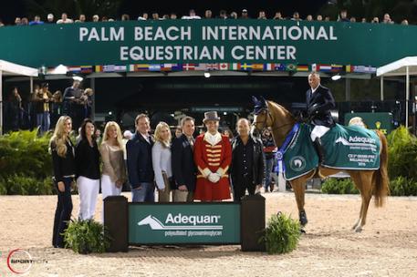 Todd Minikus and Babalou 41 in their winning presentation with (left to right) Audrey Bolte, Associate Brand Manager for Luitpold Animal Health, Caroline Hogan, Kathy Serio, Senior Territory Manager for Luitpold Animal Health, Equestrian Sport Productions CEO Mark Bellissimo, Wellington Equestrian Partners principal Katherine Bellissimo, Allyn Mann, Director, Luitpold Animal Health, ringmaster Christian Craig, and Babalou 41's owner Enrique Cadena.