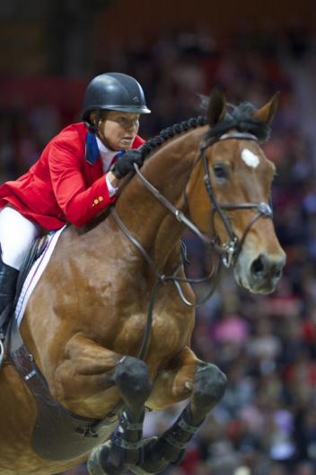 2013 FEI World Cup champions Beezie Madden (USA) and Simon (c) Arnd Bronkhorst / FEI 
