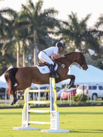 Diego Muyshondt, jumping for Team Merrill Lynch, tackles the joker fence during the gambler's choice. Photo by Mary Adelaide Brakenridge and Alexandra Lynch.