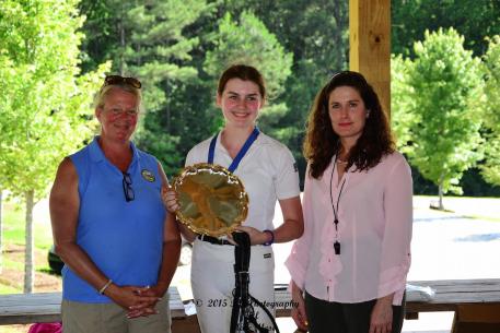 Isabelle Braden is the High Point Champion of the Dressage4Kids 2015 Atlanta Youth Dressage Festival and is awarded by Custom Saddlery. From left to right: Liz Molloy, the Youth Chair of Georgia Dressage and Combined Training Association; Isabelle Braden, and judge Danielle Perry (Photo: Marc Mesa)