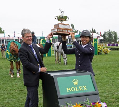 om Heathcott presents the Pan American Cup to grand prix winner Kent Farrington (Photo: Spruce Meadow Media)