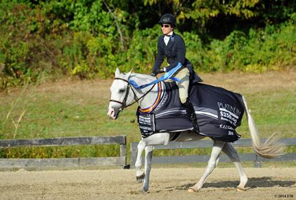 Kimberly Maloomian and Urlala after their Platinum Performance $250,000 Hunter Prix Final win. ©ESI Photography