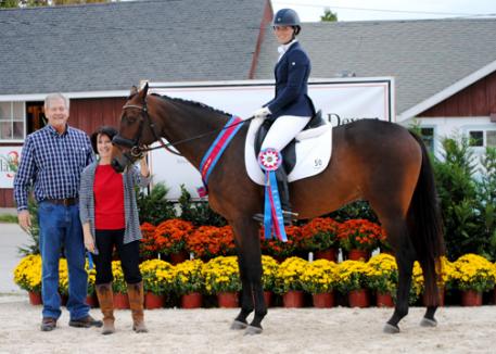 Scott Pullen and Carroll Ann Pullen with Sir Eastwood and Kymberly Pullen after winning 4 and Older Stallions and Geldings Materiale, Materiale Championship, and Born in the USA Award 