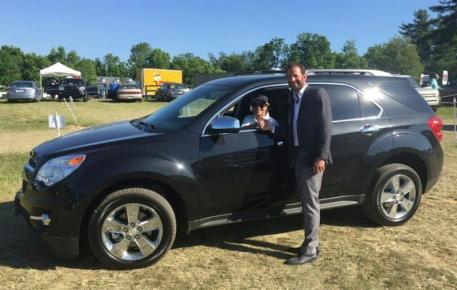 Margie Engle, the Leading Athlete at the Split Rock Jumping Tour, gets the keys to her brand new Chevy Equinox from Split Rock Jumping Tour Founder and President Derek Braun