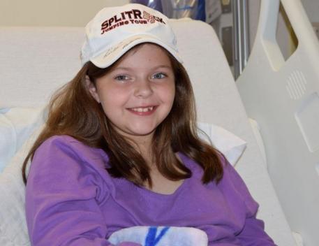 Marlee Powell wearing her autographed SRJT hat (Photos: McFarland/EqSol)