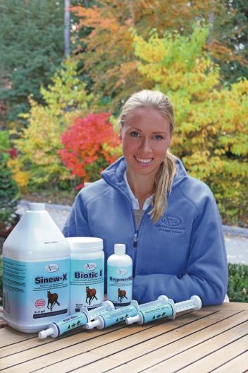 Winning Grand Prix dressage rider Megan Lane with some of her favorite Omega Alpha products (Photo: Brenda Snape) 