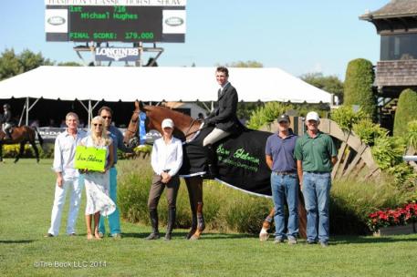 Michael Hughes won the Sam Edelman Equitation Championship. Photo by: The Book LLC 2014
