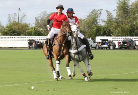Nic Roldan and Kris Kampsen bump to the ball. 