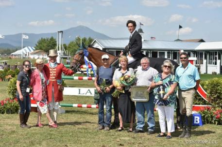 Nick Dello Joio receives his awards following his win (Photo: The Book LLC)