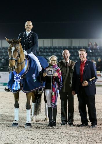 Lars Petersen and Mariett in their winning presentation with Janne Rumbough of MTICA Farm, judge Eduard De Wolff (NED), and Allyn Mann of Adequan®.