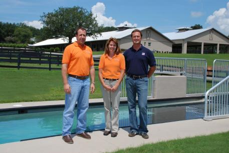 Tom Grabe, The Sanctuary's Managing Partner and Brenda McDuffee, General Manager “horse” poolside at the Sanctuary with Chester Weber. (Photo courtesy of the Equine Chronicle)