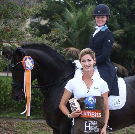 Rachael Hicks (top right) on Don Cartier wins the GumBits Happy Horse Harmony Award, with trainer Caroline Roffman (left), at the Adequan Global Dressage Festival