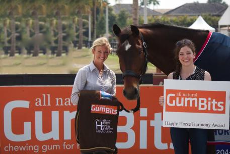 Laura Graves (left) and Verdades win the GumBits Happy Horse Harmony Award at the 2015 Adequan Global Dressage Festival