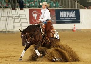 Ann Fonck and Roses For Einstein lead the first section of the Open Futurity go-round opening day of the 2015 National Reining Horse Association European Futurity.