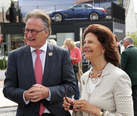 her Majesty Queen Silvia of Sweden together with the Chairman of the Aachen-Laurensberger Rennverein e.V., Frank Kemperman.