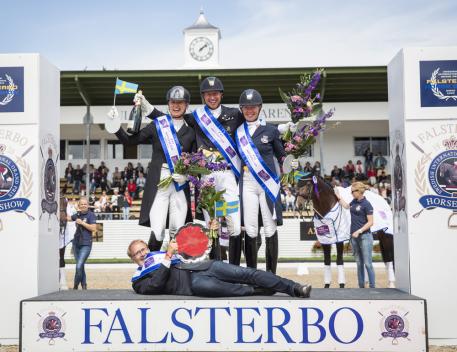 Team Sweden celebrating on the podium after clinching victory in the fifth leg of the FEI Nations Cup™ Dressage 2016