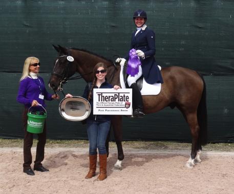 Unico G, owned and ridden by Anna Marek with trainer Anne Gribbons (left), won the TheraPlate Peak Performance Award at the Adequan Global Dressage Festival