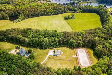 Welcome Home! Gorgeous 56.83 acre property to delight any equestrian's dream!